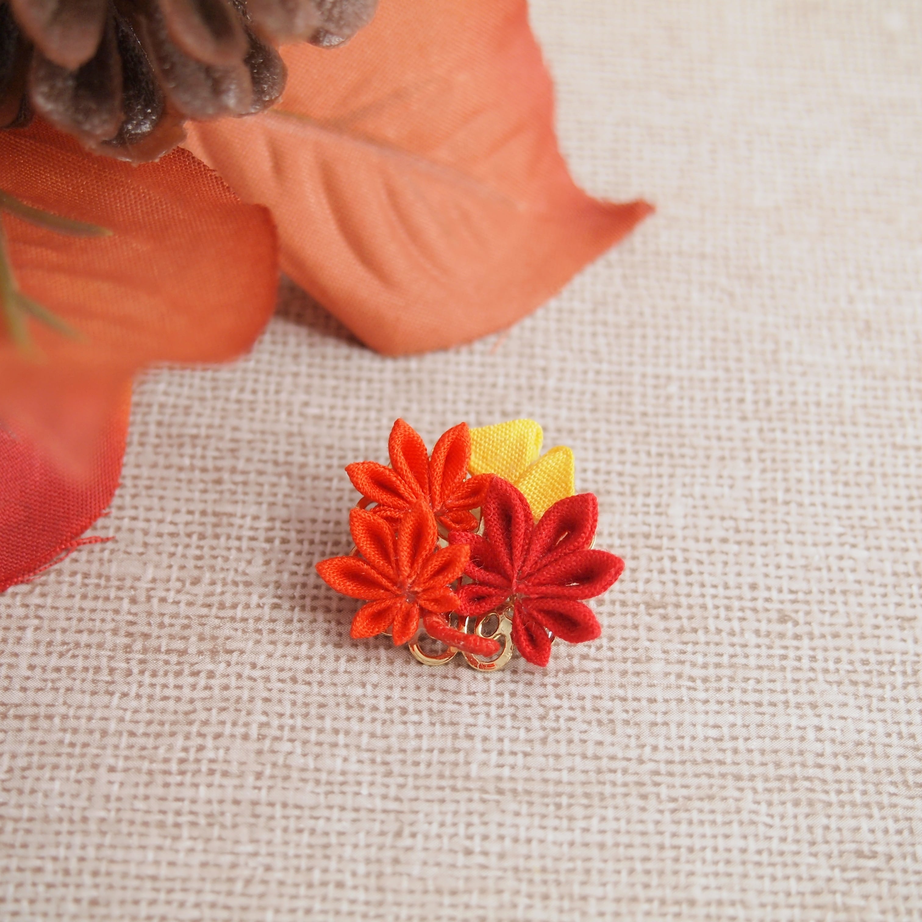 つまみストラップ・もみじ株式会社さくらほりきり